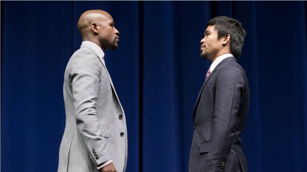 Os lutadores americano Floyd Mayweather e o filipino Manny Pacquiao na coletiva de imprensa em Las Vegas. Eles se enfrentam amanhã na "luta do século". (Foto: Divulgação)