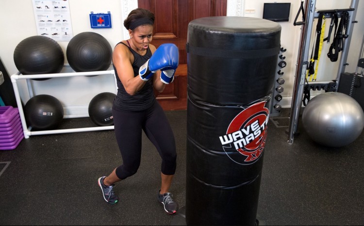 May 12, 2015 “The First Lady demonstrates her boxing skills during a #GimmeFive video taping.” (Official White House Photo by Amanda Lucidon)