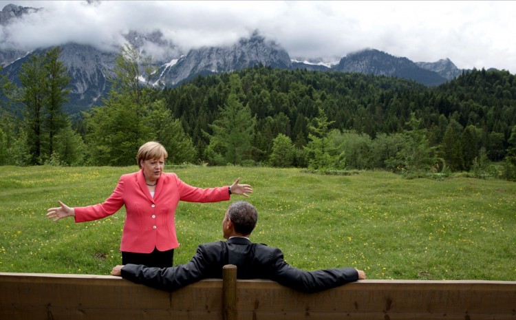 June 8, 2015 “We were at the G7 Summit in Krün, Germany. Chancellor Angela Merkel asked the leaders and outreach guests to make their way to a bench for a group photograph. The President happened to sit down first, followed closely by the Chancellor. I only had time to make a couple of frames before the background was cluttered with other people.” (Official White House Photo by Pete Souza)