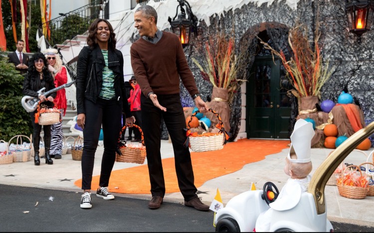 Oct. 30, 2015 “The President and First Lady react to a child in a pope costume and mini popemobile as they welcomed children during a Halloween event on the South Lawn of the White House.” (Official White House Photo by Pete Souza)